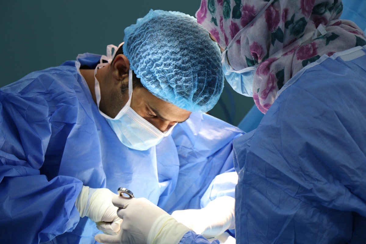 Surgical team preparing an operating theatre for a minimally invasive day surgery procedure